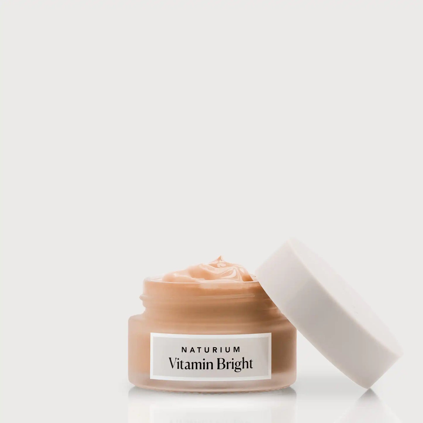 vitamin-bright-illuminating-eye-cream-t6 NATR-VitaminBright_DEEP_Primary_front_openjar_bone.webp