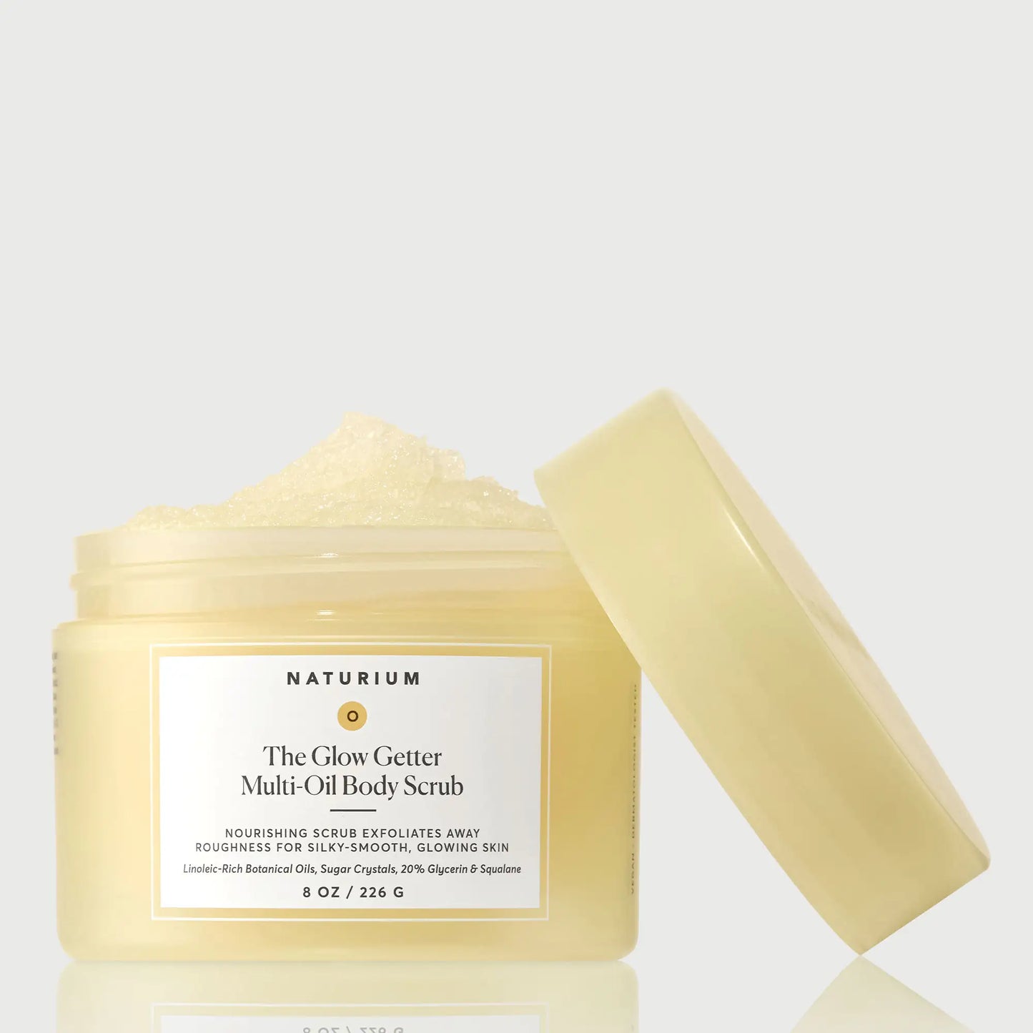 the-glow-getter-multi-oil-body-scrub-f0 NATR-40028-GlowGetter-Multi-Oil-Body-Scrub-Front-CapOff-bonebkgd.webp