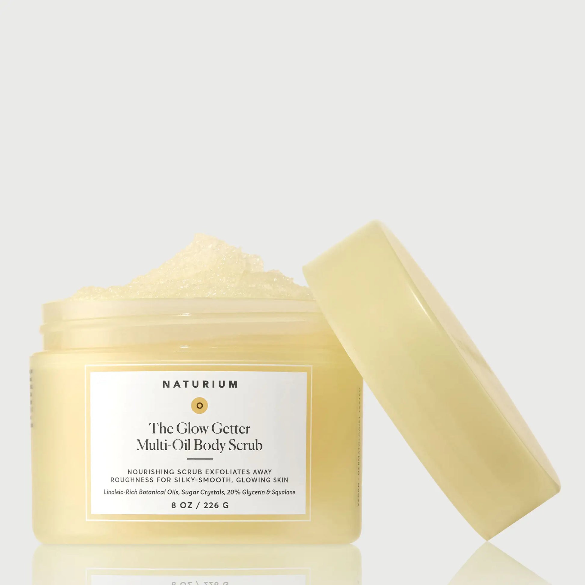 the-glow-getter-multi-oil-body-scrub-f0 NATR-40028-GlowGetter-Multi-Oil-Body-Scrub-Front-CapOff-bonebkgd.webp