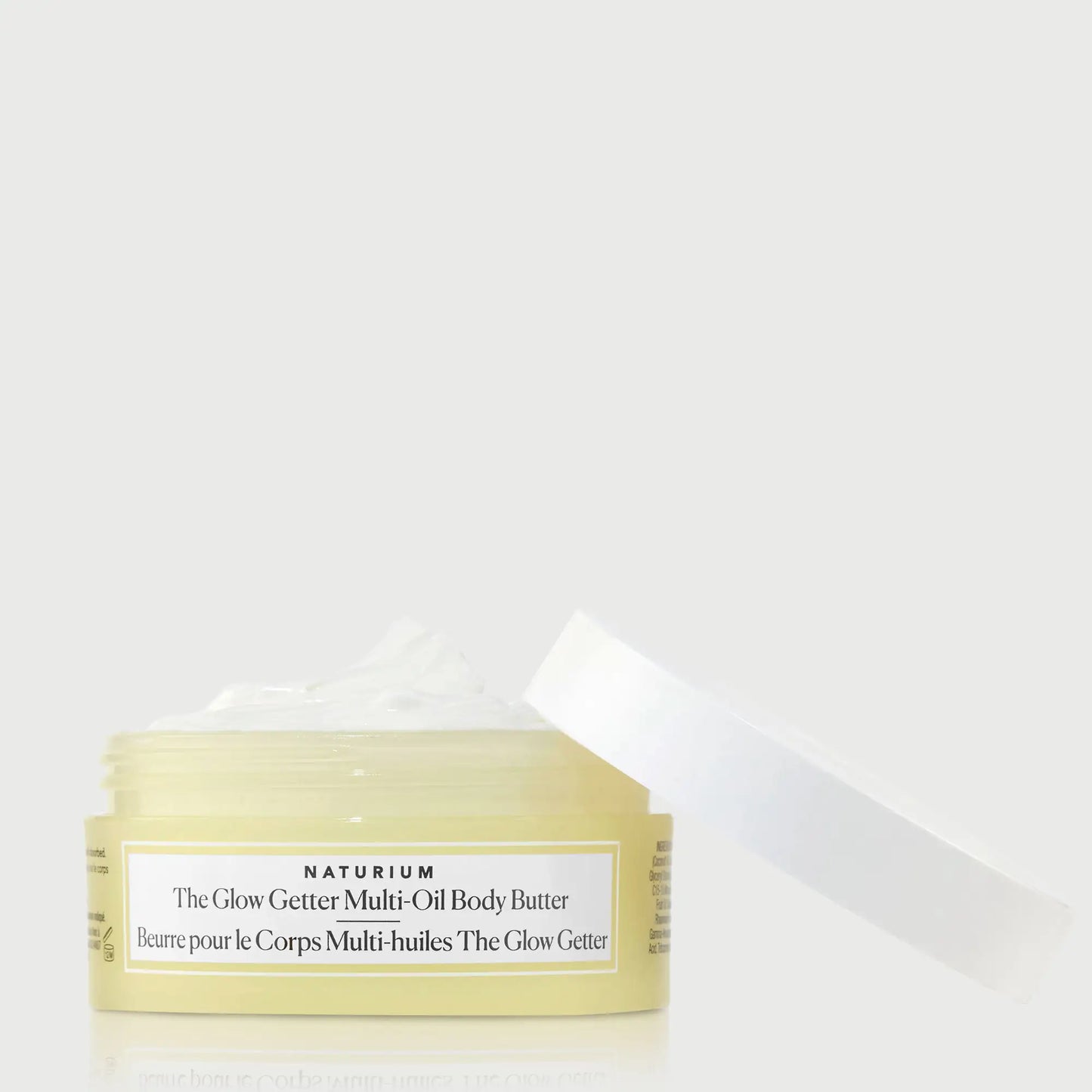 the-glow-getter-multi-oil-body-butter-travel-size-i7 NATR-40115_Glow-Getter-Body-Butter-Mini_front_capoff_bonebkgd.webp